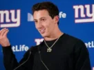How much debt did Tommy DeVito have