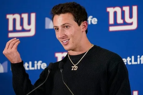 How much debt did Tommy DeVito have